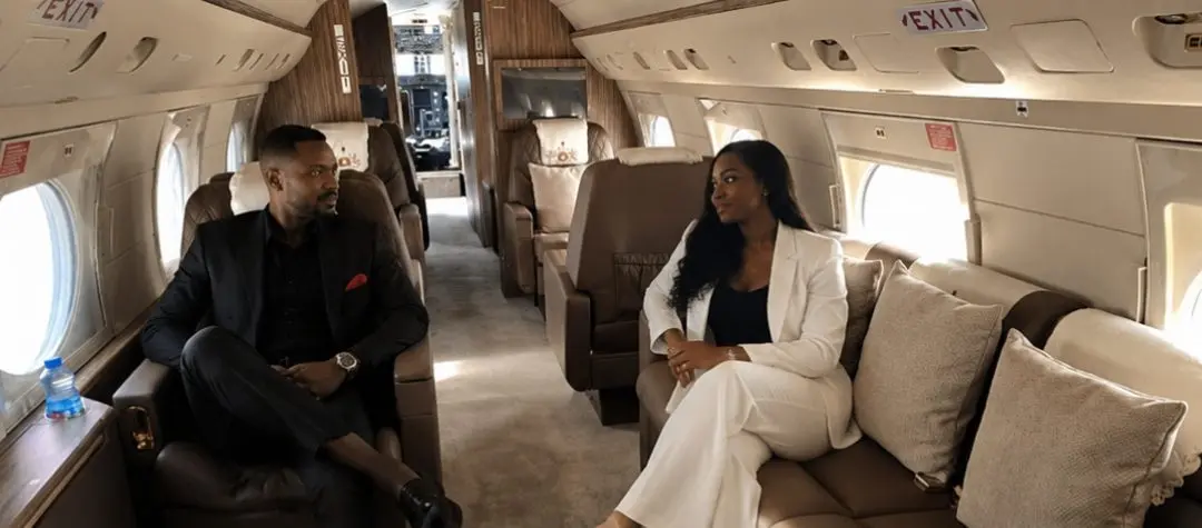 Passengers in conversation aboard an international private jet charter flight